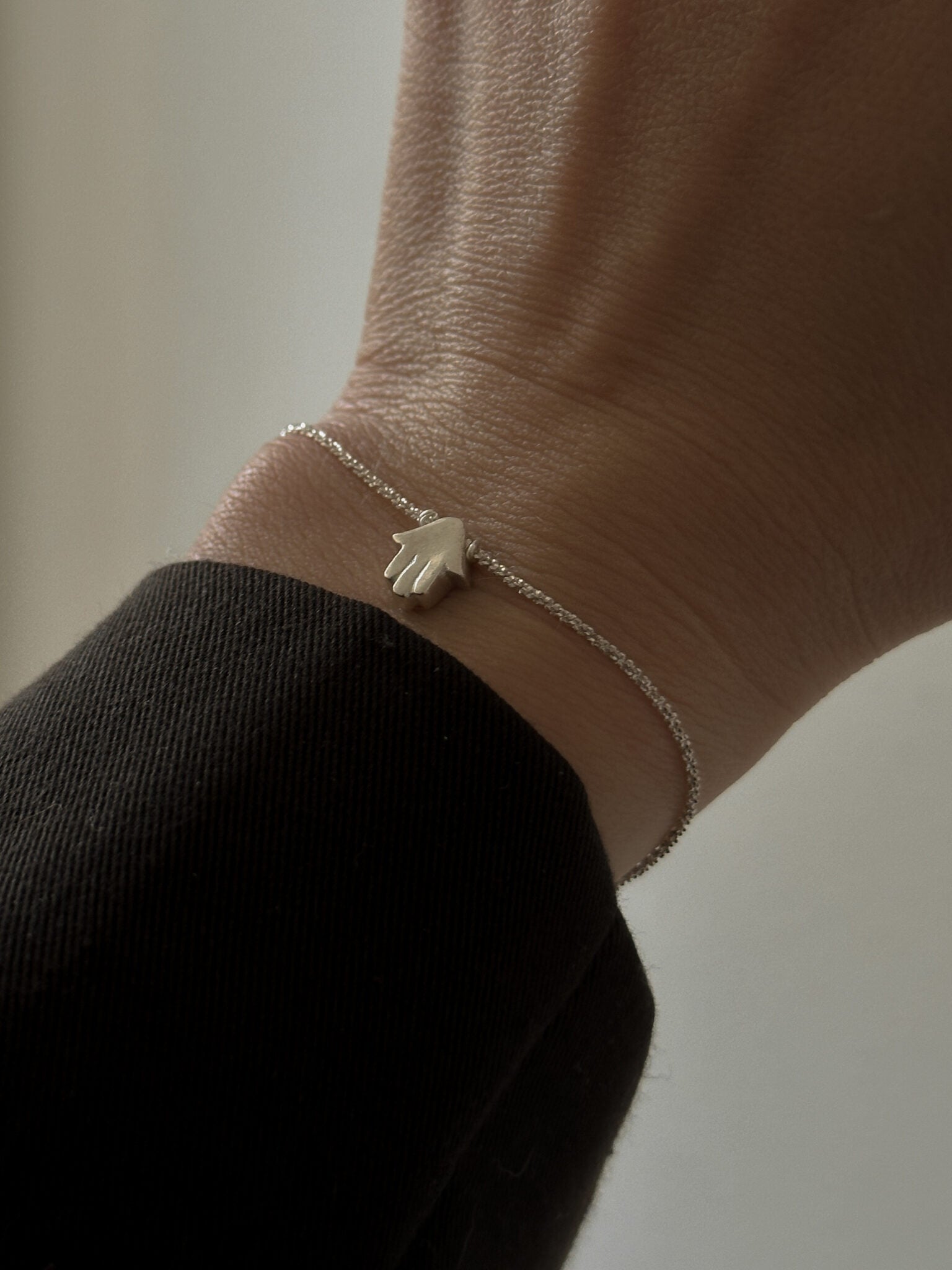 Mishel & Hamsa bracelets silver