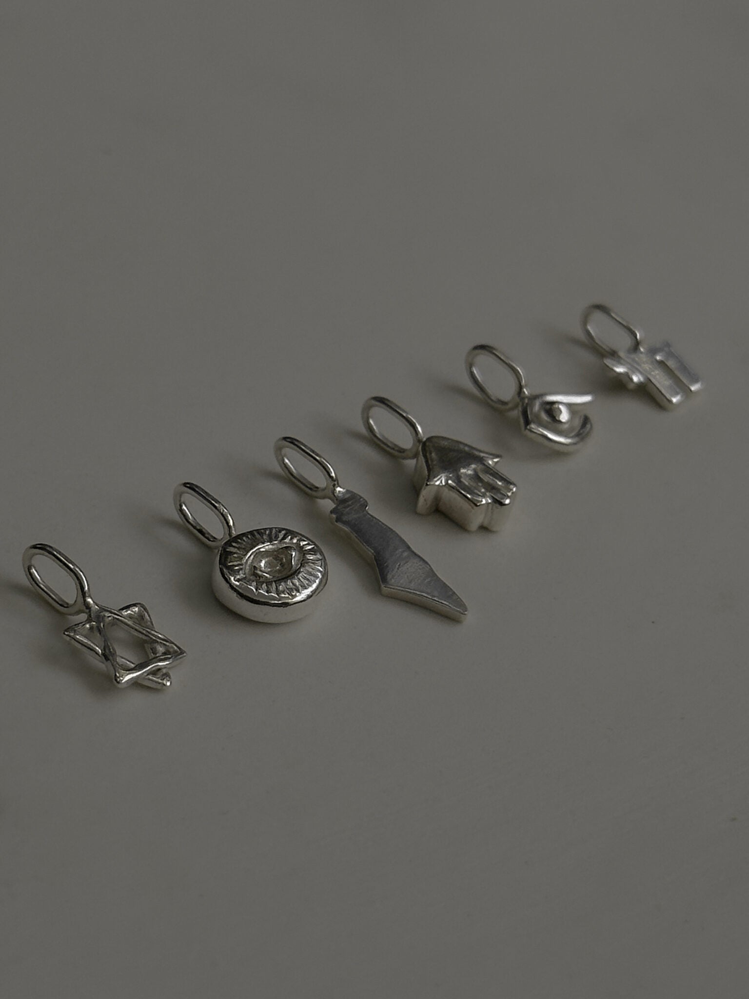 קמע עין מוטבעת כסף