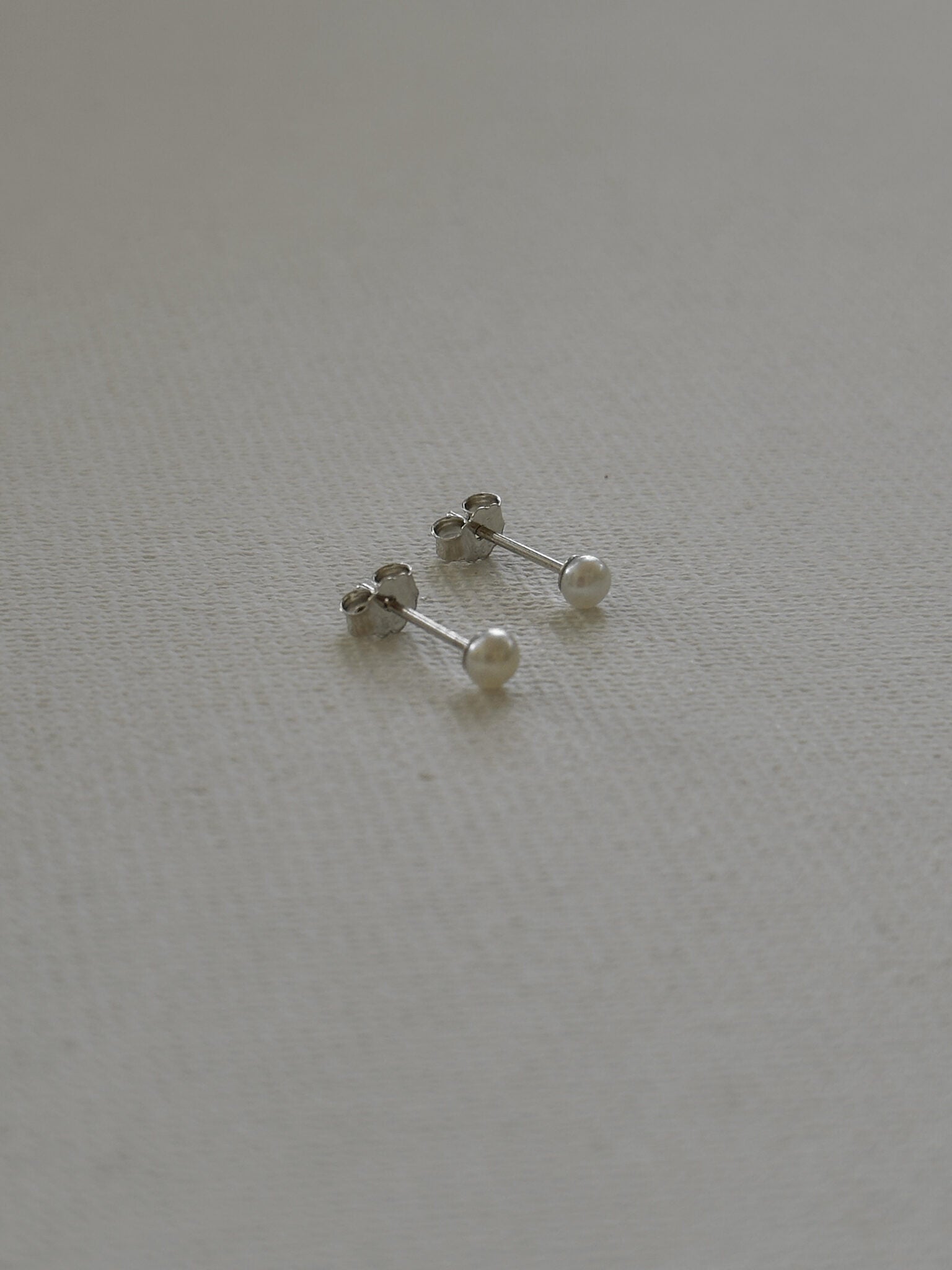 עגילי פנינה צמודים XS