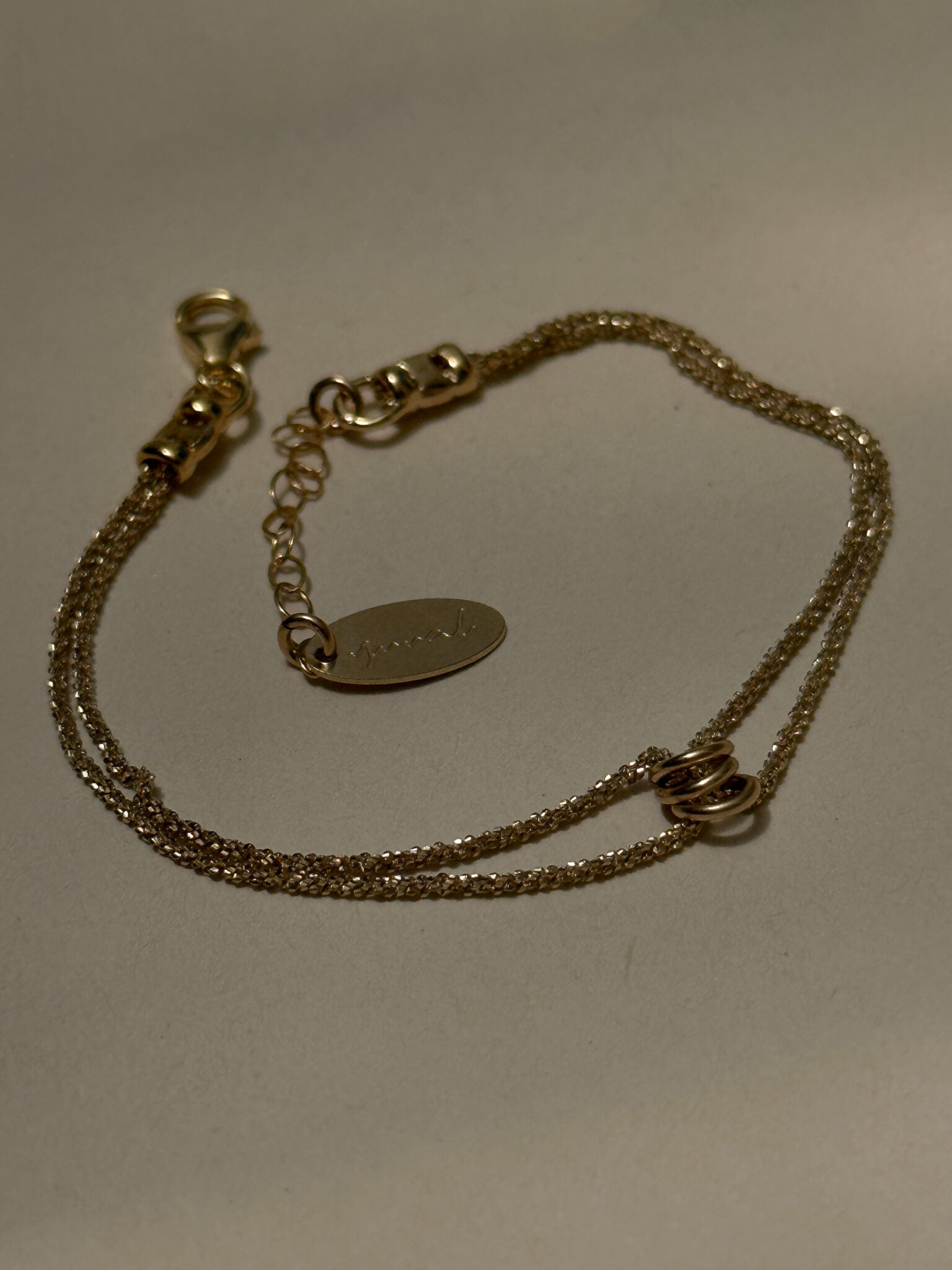Mishel & Hamsa bracelets gold