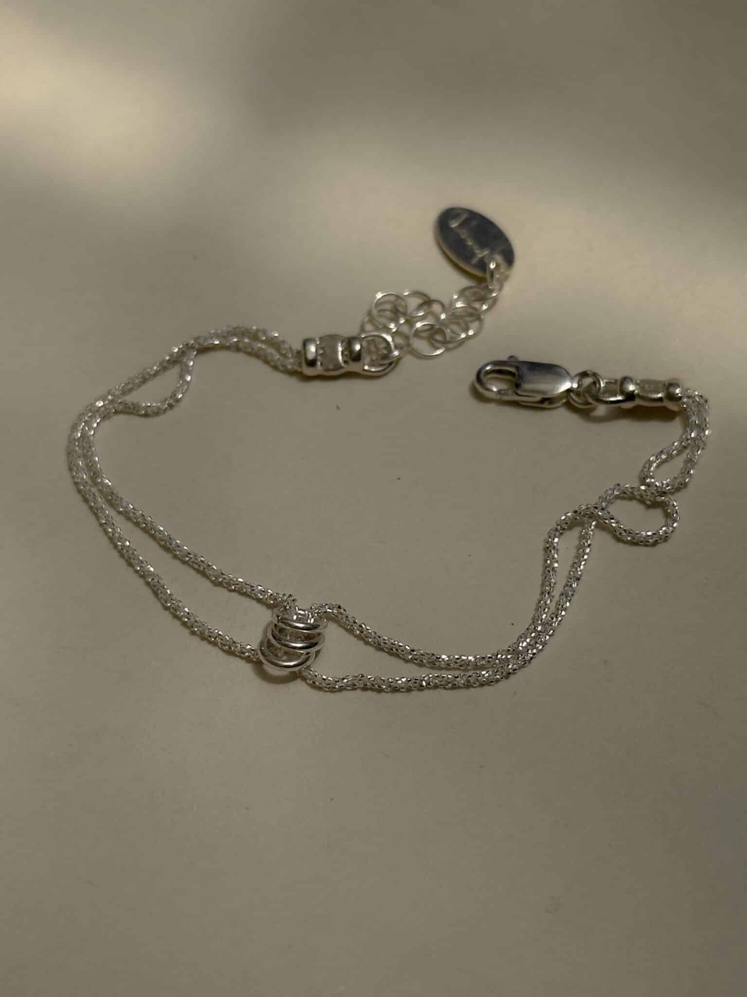 Mishel & Hamsa bracelets silver