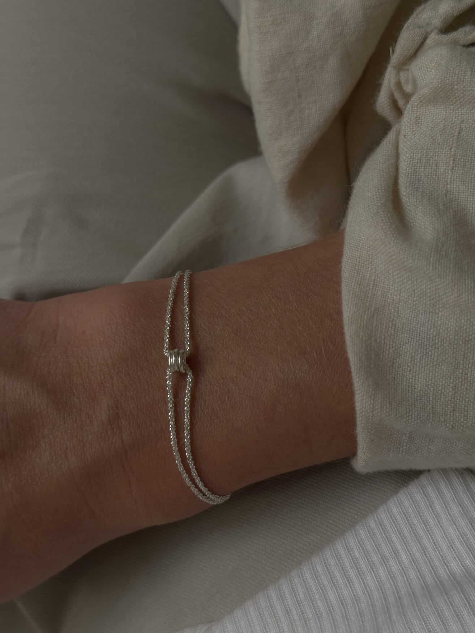 Mishel & Hamsa bracelets silver